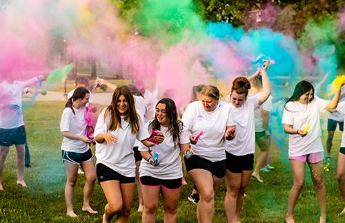 Students on SBU Bolivar campus doing color zumba together